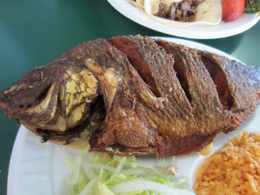 Mojarra Frita (special) deepfried tilapia with rice, small salad