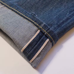 Denim Doctors - Los Angeles, CA, United States. High quality chain-stitch hemming offered on the spot!