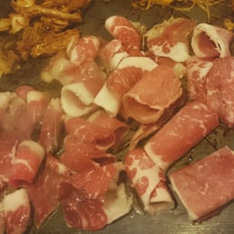 Oh! My SamGyupSal - Duluth, GA, United States. Thinly sliced pork belly with some kimchee on the side.