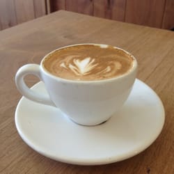 Innisfree Poetry Bookstore & Cafe logo
