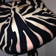 Regency Cleaners - Los Angeles, CA, United States. Purse /w pink soda stain on the bottom. yuck!