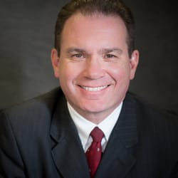 John M. Dovenbarger - Your Castle Real Estate logo