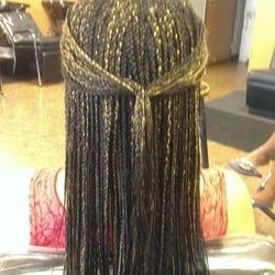 Salon De Coiffure logo