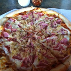 Justine's Pizza logo