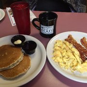 Omelette & Waffle Cafe - Plymouth, MI, United States. 2 eggs, 3 strips of bacon, 2 pancakes for $4.25