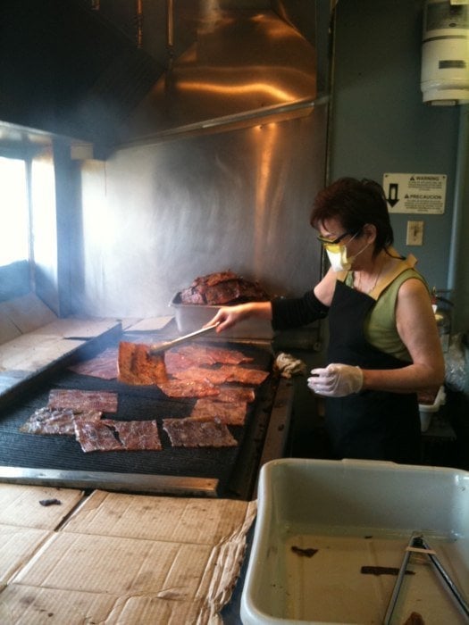 Grilling up the meat Yelp