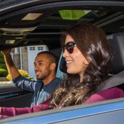 Photo of Fiix - Toronto, ON, Canada. Jahmal and Jocelyn after having their battery replaced on their Mercedes.