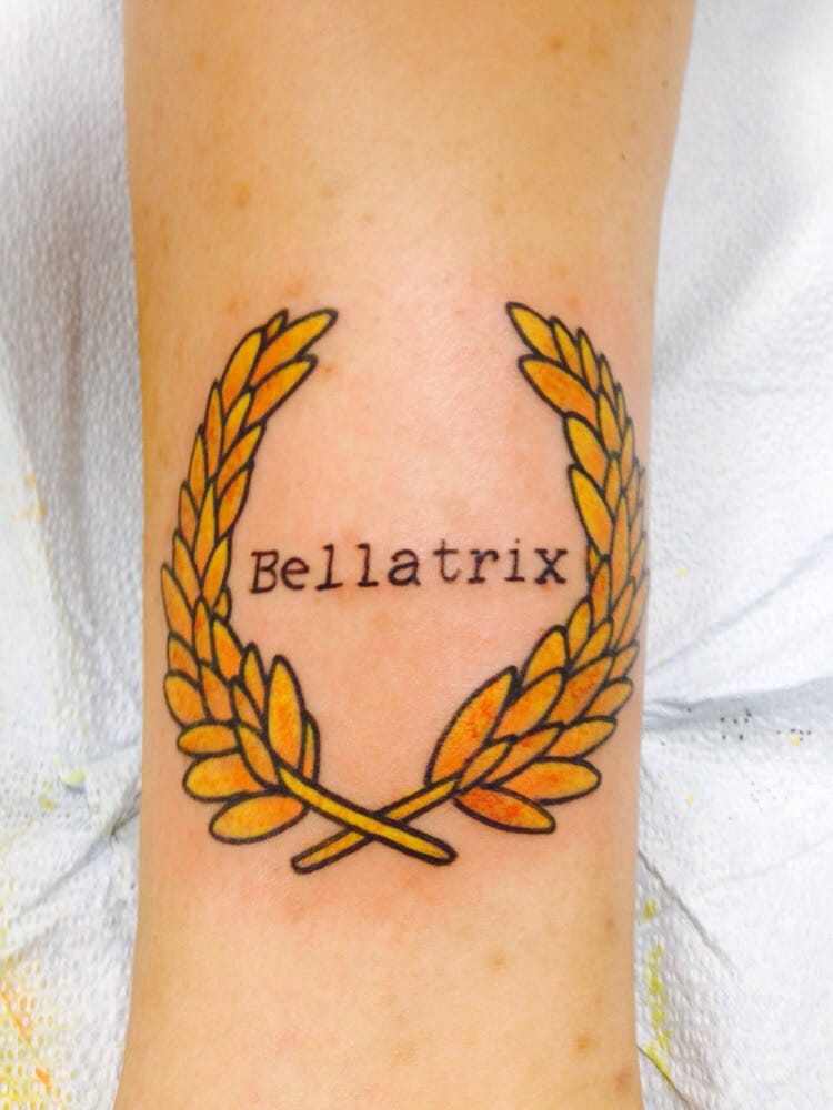 yellow wreath with the latin word meaning female warrior yelp yellow wreath with the latin word meaning female warrior yelp