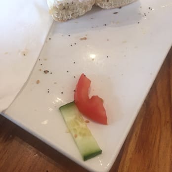 Photo of Cafe Coco - San Francisco, CA, United States. Paid extra for cucumber & tomato, & they bring me a plate with those two strips. I had to ask for them to put some IN my bagel.