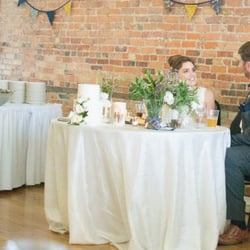 Tom Thompson Flowers - Ann Arbor, MI, United States. I told Tom and team that I wanted loose arrangements of herbs on our tables and he sure did deliver! The arrangements were beautiful!