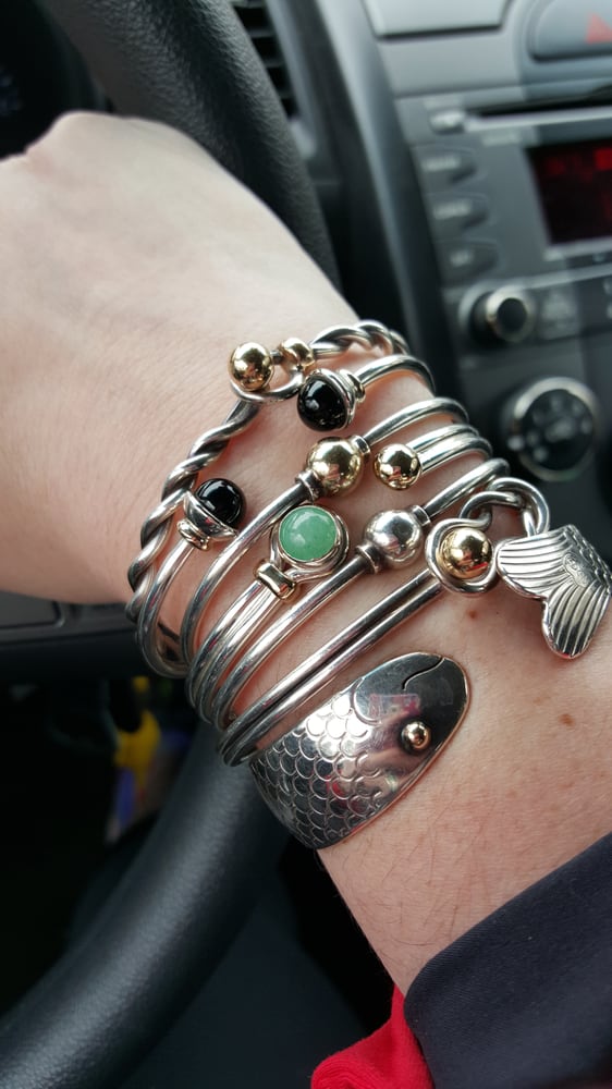 It's an addiction. The jadelike ball bracelet is their