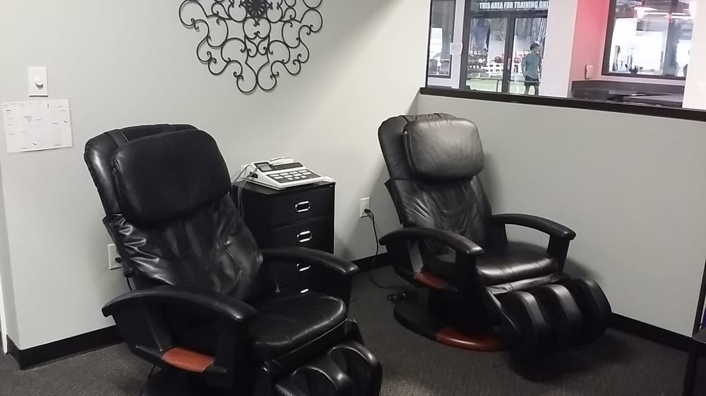 Electrical Muscle Stimulation Kinesio Taping And Massage