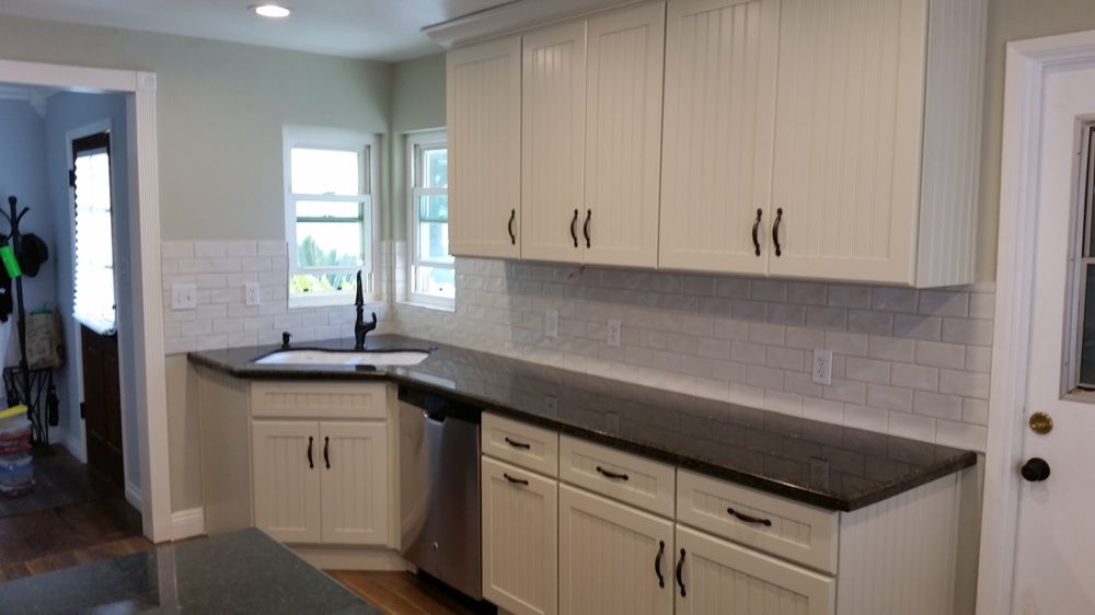 Dove White Cabinets With Bead Boarding Backsplash Is Handcrafted Photo Of Elegant Kitchens And Bath Orange Ca United States Dove