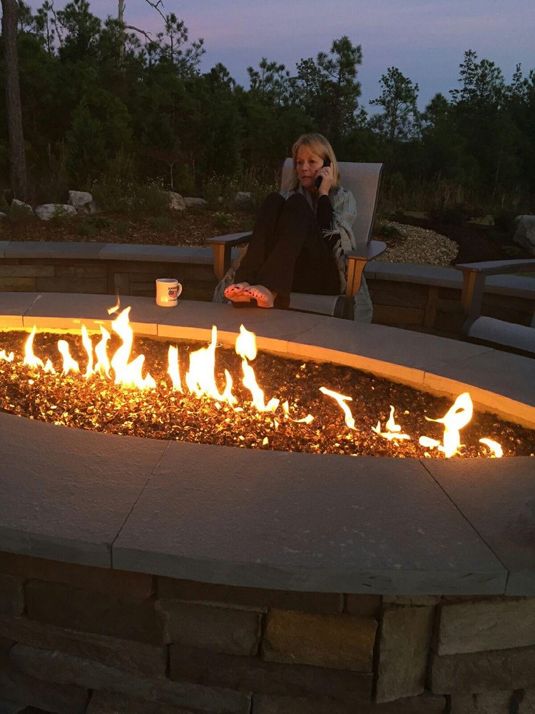 Copper Reflective Original Fire Glass In A Lit Pit At Night Yelp 42 Photos For Fire Pit Essentials