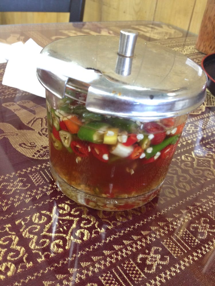 Thai chili pepper infused fish sauce! So good & spicy ) Yelp