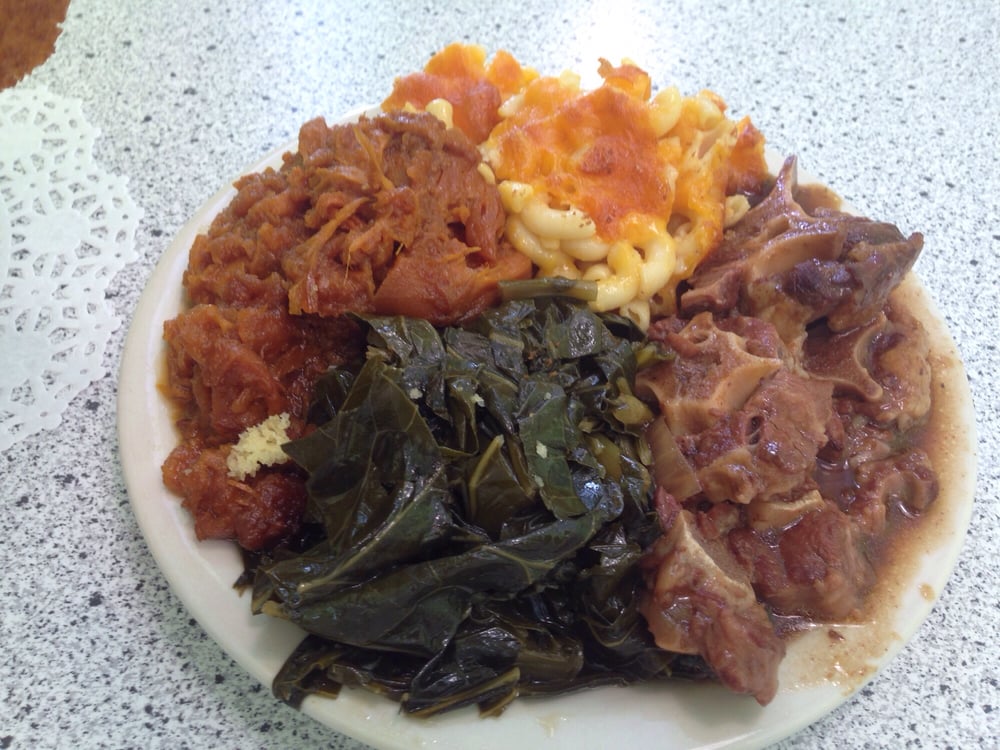 Oxtail, collard greens, Mac and cheese, and candied yams. The cornbread