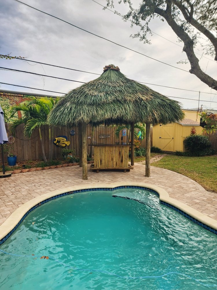 image of business Oasis Tiki Huts Builder & Repair