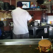 Photo of Tortas Neza - Corona, NY, United States. That guy is a genius and his hair is purple.. not kidding.
