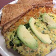 Omelette & Waffle Cafe - Plymouth, MI, United States. Green omelette-- see the chunk of asparagus in there? Can't get that at any old diner