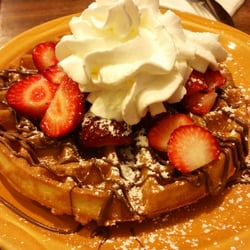 Bogart's Cafe - Honolulu, HI, United States. Belgian Waffle with Strawberry and Nutella