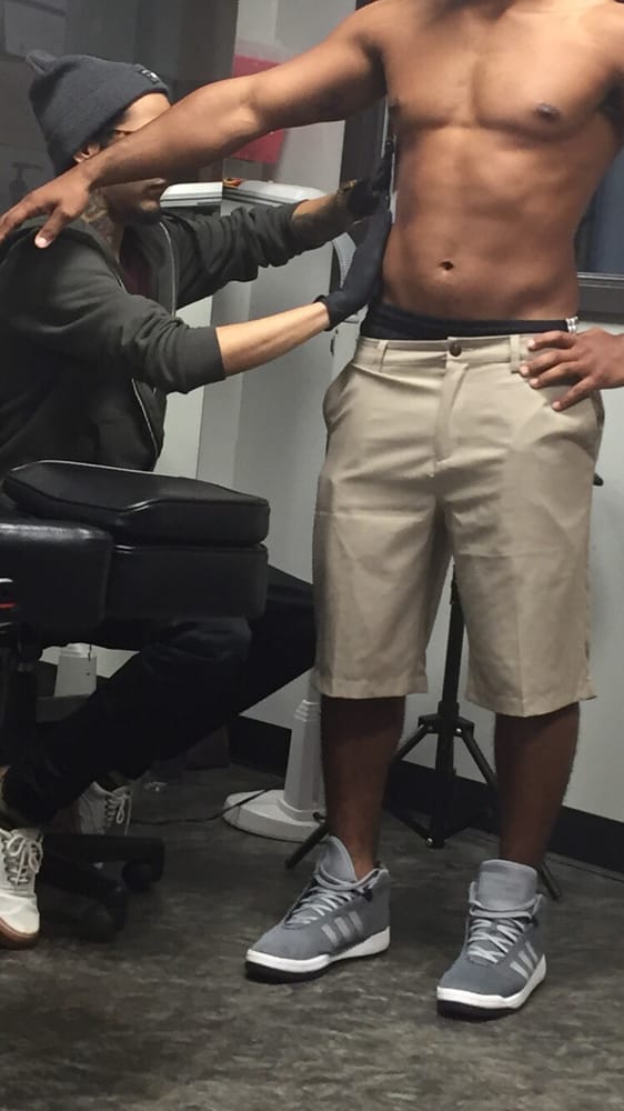Davi prepping the kid for tat - Yelp