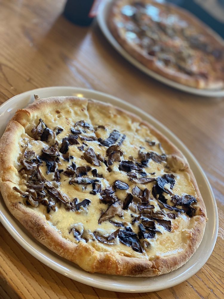 Peel Wood Fired Pizza