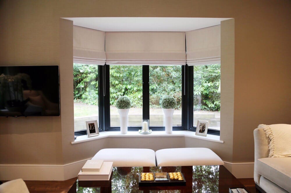 Cream Roman Blinds In A Bay Window Yelp Photo Of Inspiring Curtains And Blinds Woodford London United Kingdom Cream Roman