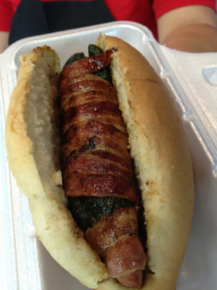 The chile relleno dog stuffed with bacon wrapped hot dog and cheese. No