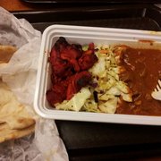 Muskaan Cuisine of India - San Francisco, CA, United States. Lamb curry and tandoori chicken with naan bread