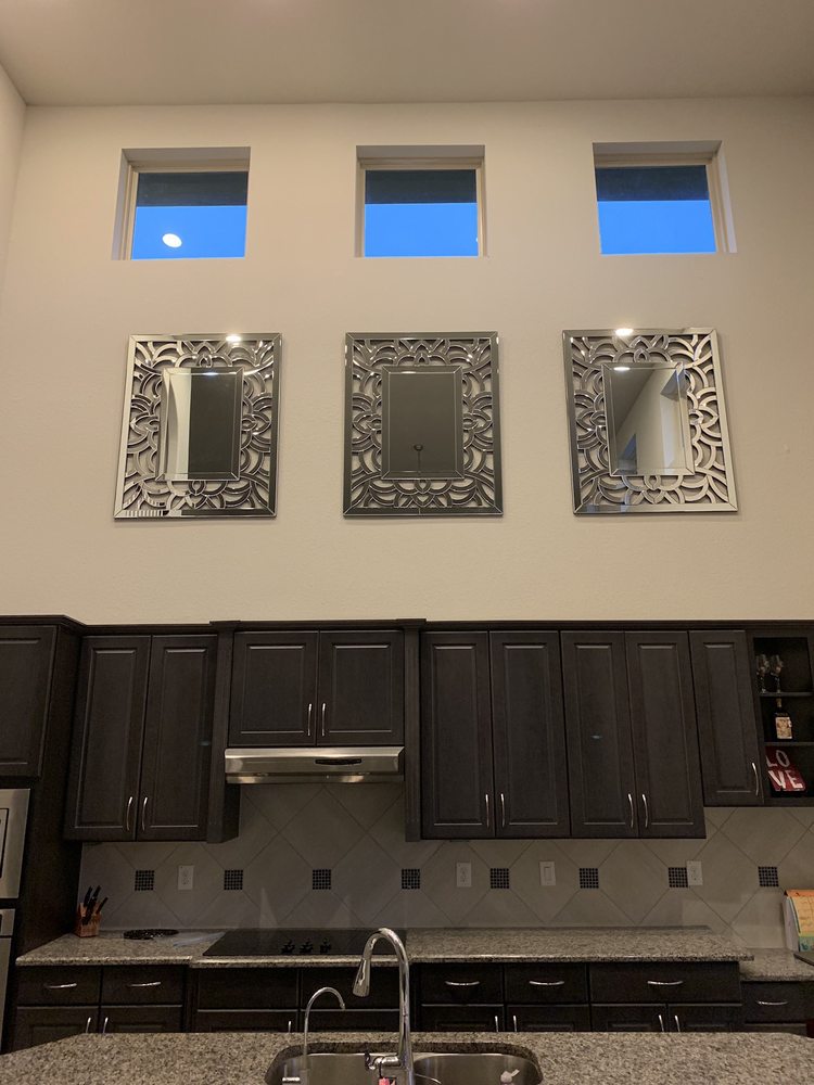 Three Very Heavy And Large Mirrors On A High Wall Not An