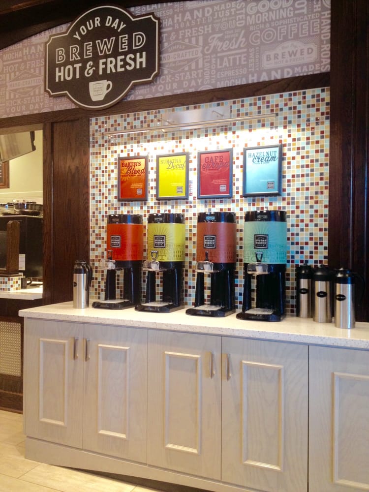 The self-serve coffee station at Corner Bakery - Yelp