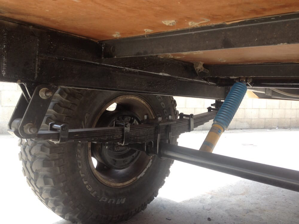 Deaver made these custom Leaf Springs, Shackles, Axel, and Shock Mounts