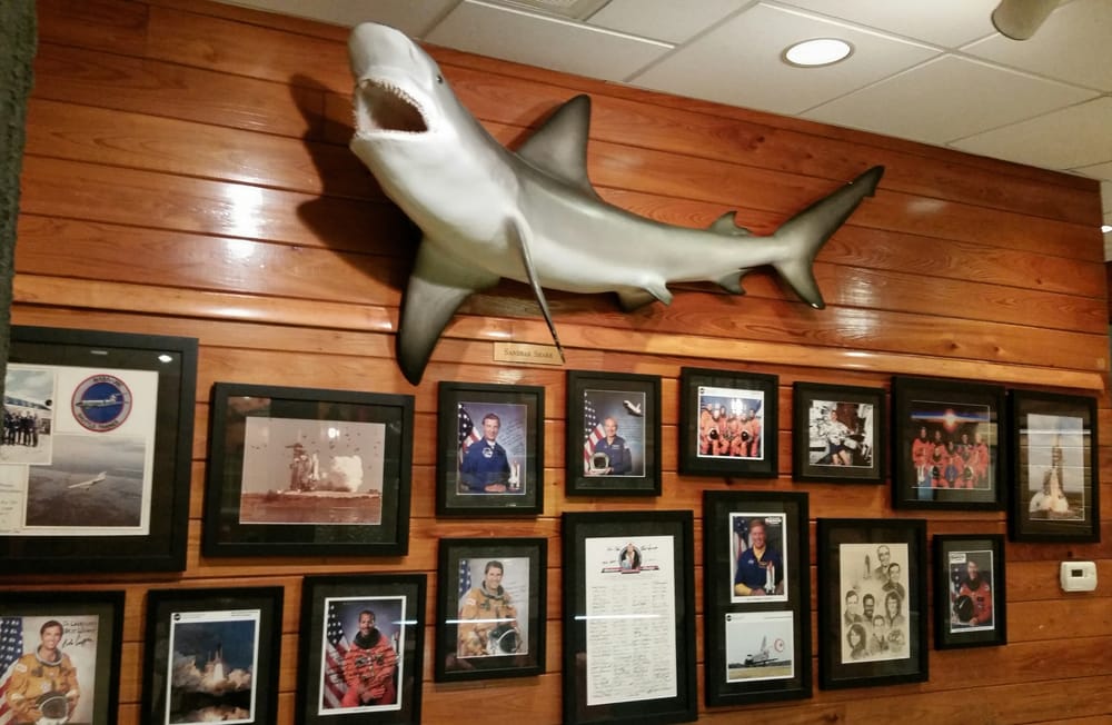 The Nasa Wall Yelp Photo Of Dixie Crossroads Seafood Restaurant Usville Fl United States The Nasa
