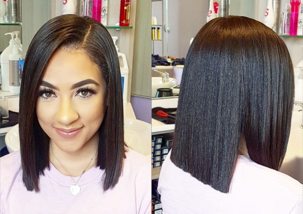 This shinny very dark Brown color long Bob blunt hair cut by