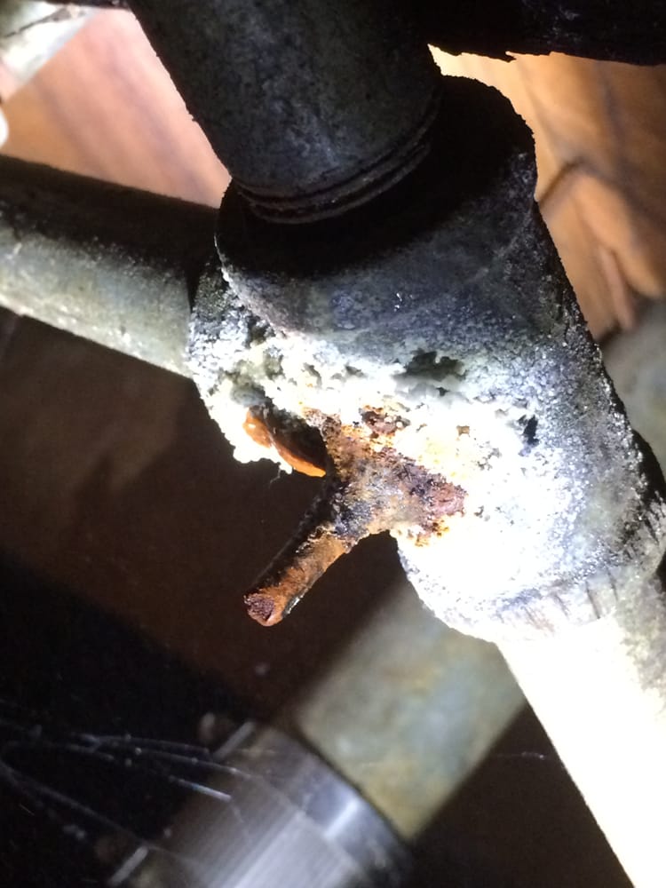 Old galvanized water pipes rusted overtime. Internal rust and
