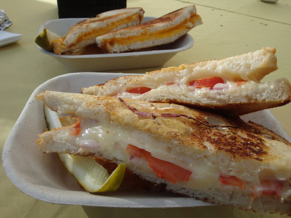 Provolone grilled cheese with the sad little pickle Yelp
