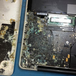Photo of My Green Mac Repair - Fairfield, CA, United States. The logic board before the repair from liquid damage