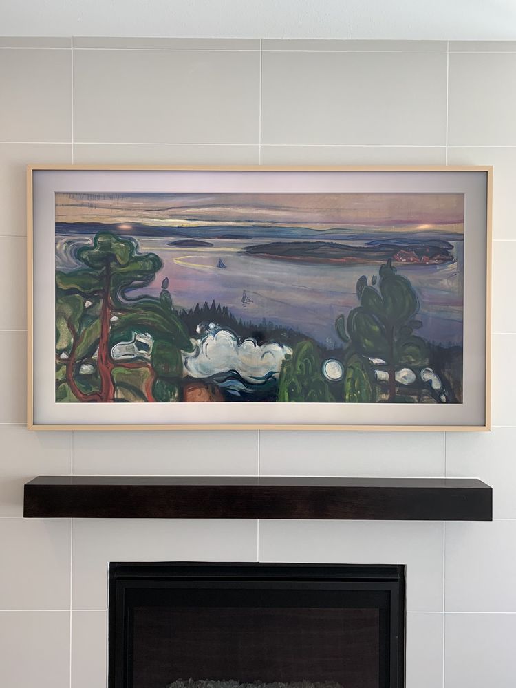 Frame Tv Installed On A Tile Wall Above Fireplace Yelp