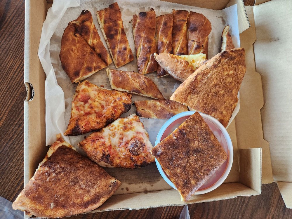 Varsity Sports Cafe & Roman Coin Pizza