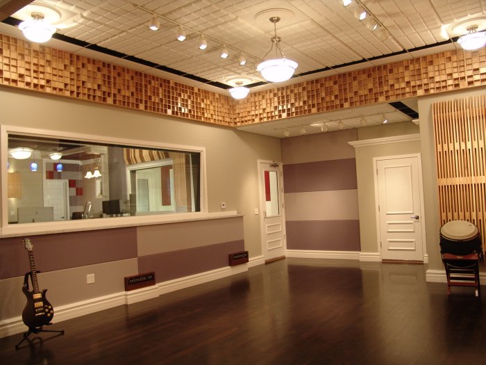 custom designed live room with acoustic window treatment ceiling