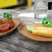 Photo of Boteco - Austin, TX, United States. Coxinha and yucca fries!!! Cute little Brazilian flags add a nice touch :)