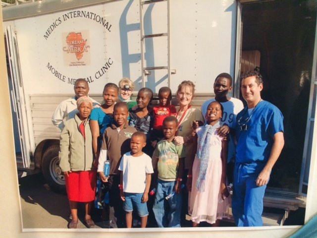 Dr. McGee takes care of the orphans with "Heart for Africa ...