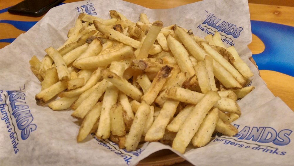 Endless Basket Of Fries Salty As There Is Enough Salt Here Photo Of Islands Restaurant Long Beach Ca United States Endless Basket