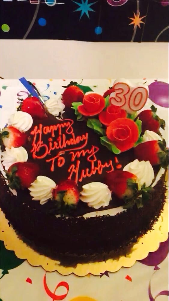 Customized cake for hubby�s birthday. Chocolate cake with