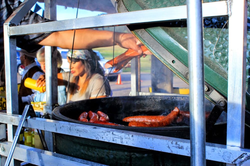 Photo of Uncle Freds Franks - Littleton CO United States Grilling em up on the The Big Green Egg Photo Courtesy of foreverandeverettphotographycom