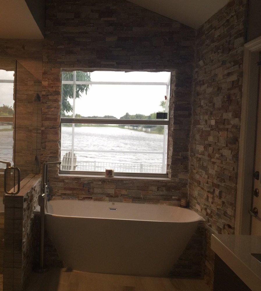 This is a picture of the bathtub with and amazing rock mosaics in ... This is a picture of the bathtub with and amazing rock mosaics in ...