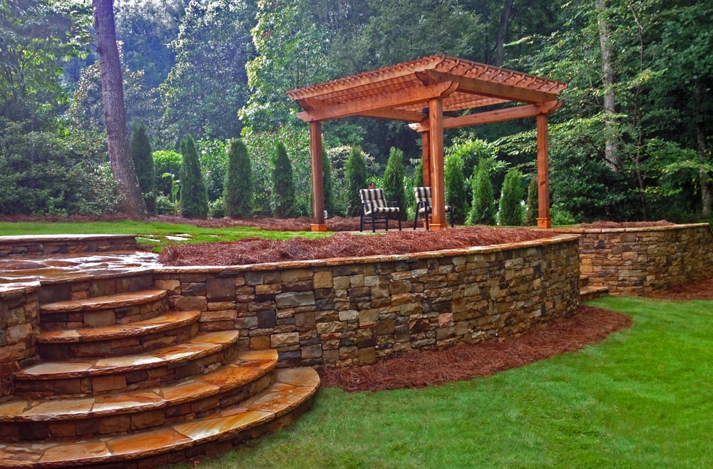 Stone Retaining Wall And Stairs With Outdoor Landscape Lighting Photo Of Cutting Edge Landscape Contractors Marietta Ga United States Stone Retaining