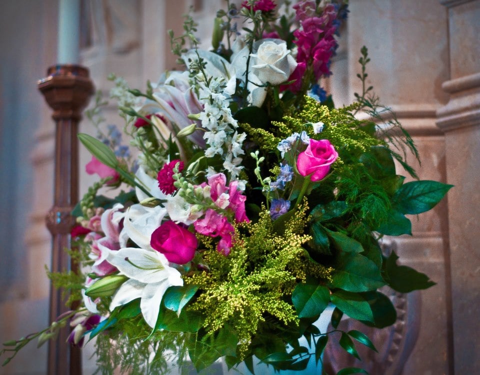 Huge, beautiful, and colorful flower arrangement for church altar. Yelp